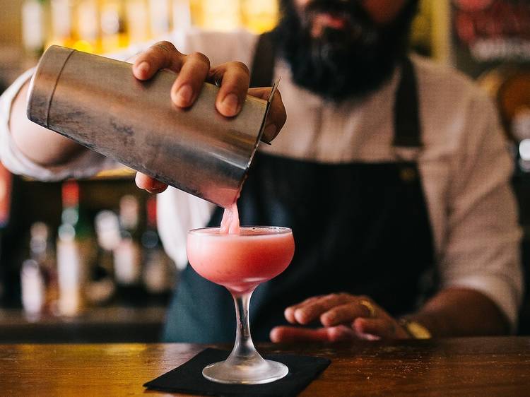 Take an elbow at a cool cocktail bar