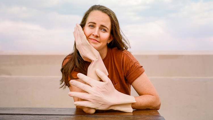 Zoë Coombs Marr with big hand gloves on