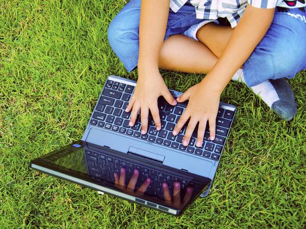 NYC schools opened registration for complete remote learning this fall children laptop grass
