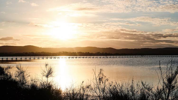 Take a relaxing bike ride along the foreshore at sunset