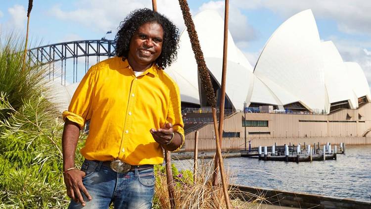 Indigenous tour guide Sharni in front of the Opera House