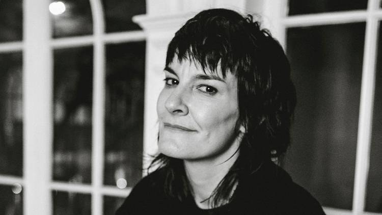 A black and white photograph of Jen Cloher