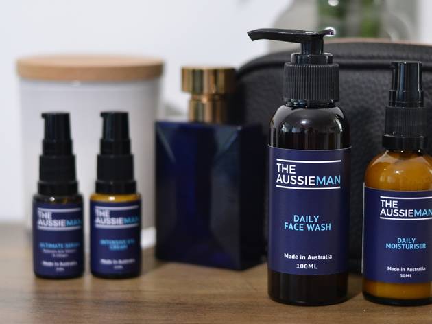 The Aussie Man skincare Products in front of a pouch