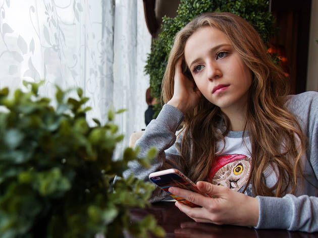 Sad girl with phone Sad girl with phone