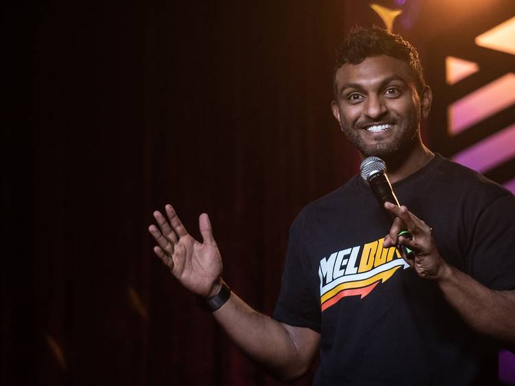 Nazeem Hussain performing on stage