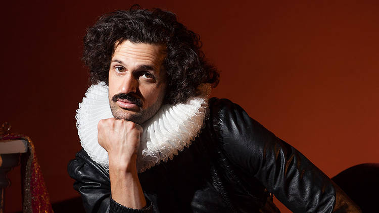 Comedian Garry Starr looking thoughtful while wearing a neck ruff