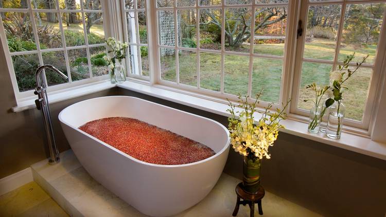 Treatment room with bath tub at Parklands Day Spa