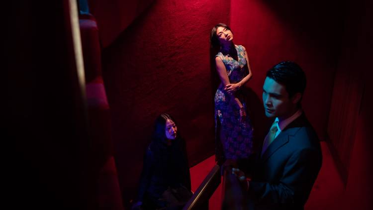  Rainbow Chan, Eugene Choi and Marcus Whale bathed in lighting reminiscent of Wong Kar-Wai's classic film In The Mood for Love 