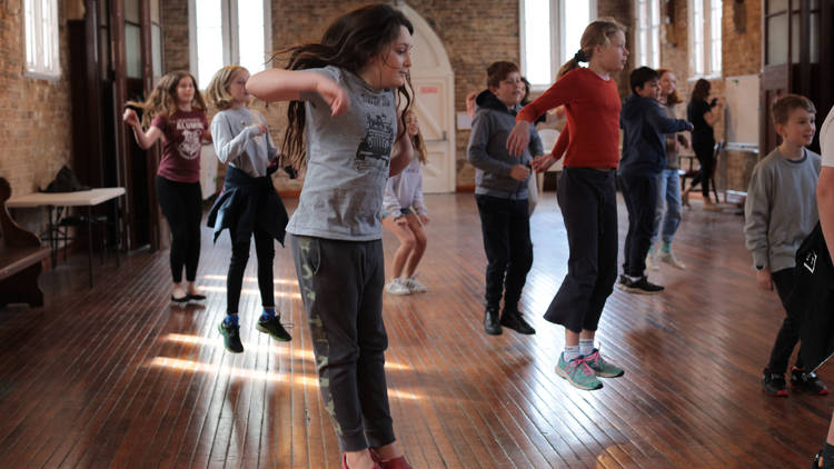 Kids jumping at an ATYP drama workshop