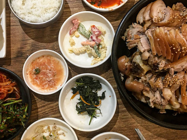 Pu Ji Mi Korean cuisine including pork and banchan