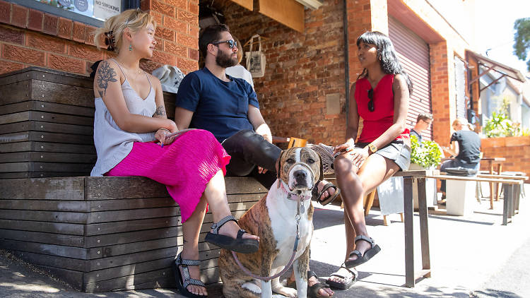 Two Chaps customers and dog (Photograph: Daniel Boud)