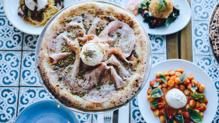 Pizza, pasta and gnocchi with burrata on top