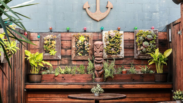 The wood-lined garden terrace at the Cauliflower hotel