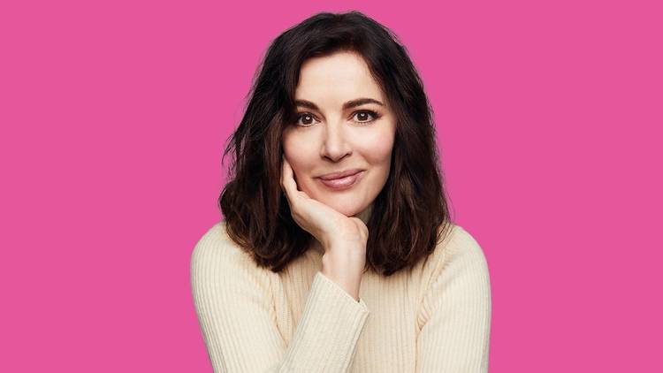 Nigella Lawson on a pink background