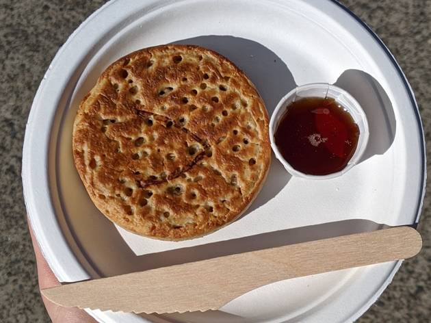 Crumpets by Merna A crumpet on a plate with syrup