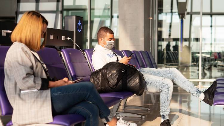 nyc airport people wearing masks