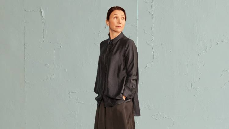 Anita Hegh in dark smocks in Belvoir's A Room of One's Own