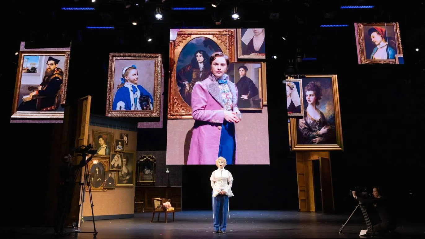 Eryn Jean Norvill performs in The Picture of Dorian Gray surrounded by projected portraits