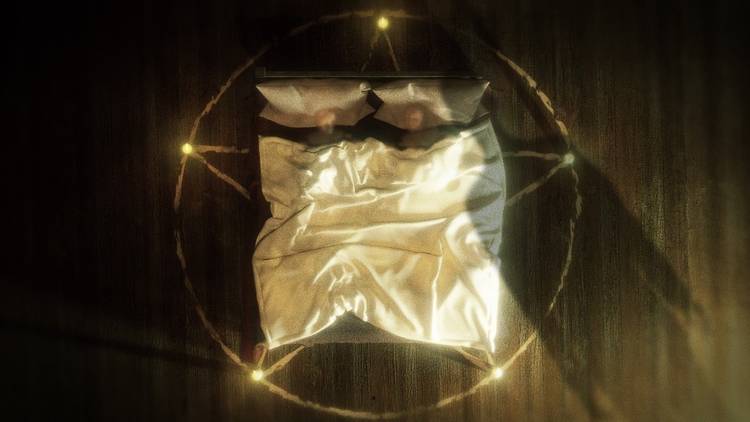 Bed surrounded by a pentogram