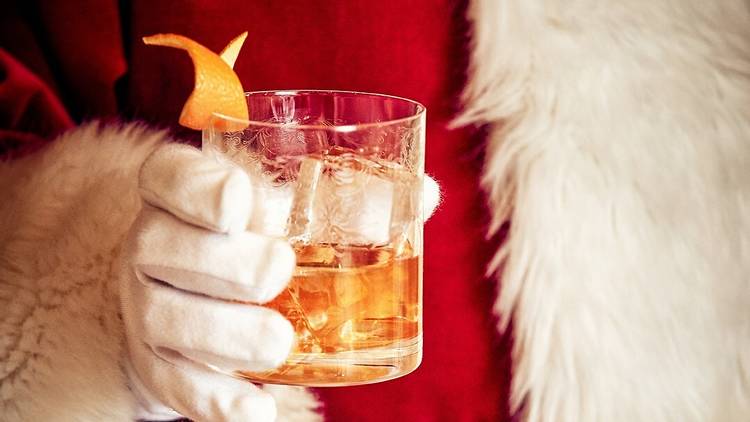 Cocktail held by Santa