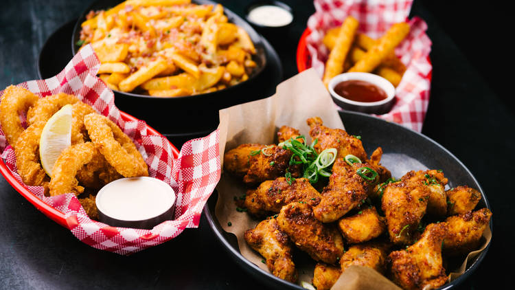 Lone Star fried chicken, calamari, loaded fries and fries with sauce