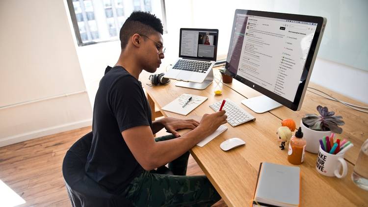 A man at his office desk