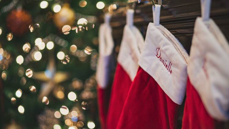 Hang stockings at the end of the bed