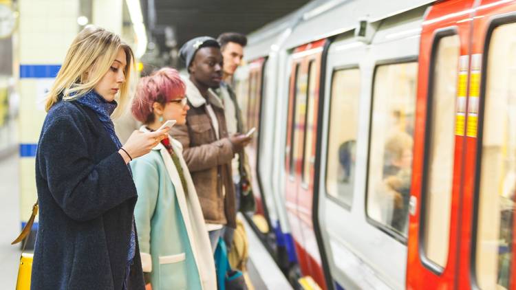 people waiting for the tube on London Underground