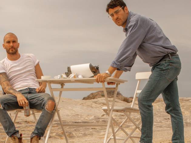 True West, Flight Path Theatre 2021 Two brothers in denim sitting at a table in the desert