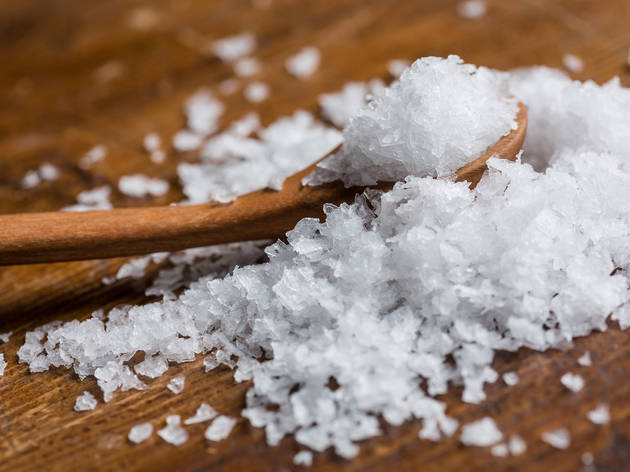 Maldon sea salt on wooden spoon Maldon sea salt on wooden spoon