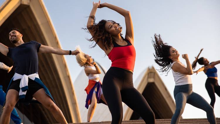 People dancing on the steps of the Opera House