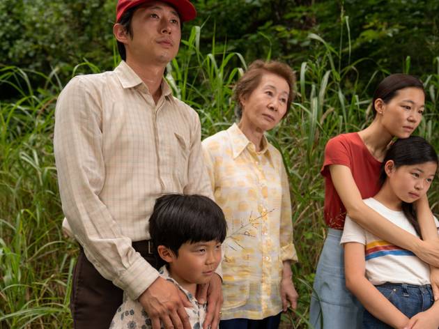 Minari 2021 The Korean American family of film Minari huddle in front of green shoots