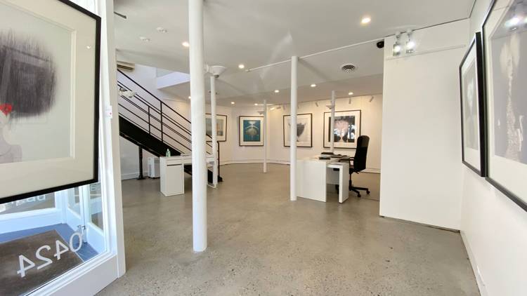 Art2Muse gallery interior shot with polished concrete floors and white walls 