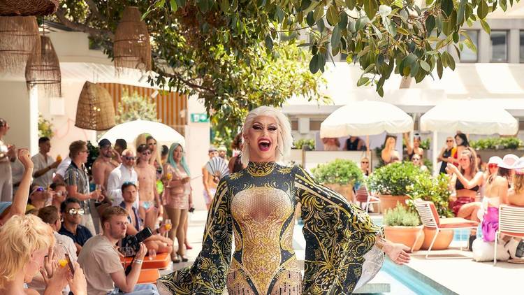 Party by the pool and dance with famous drag queens