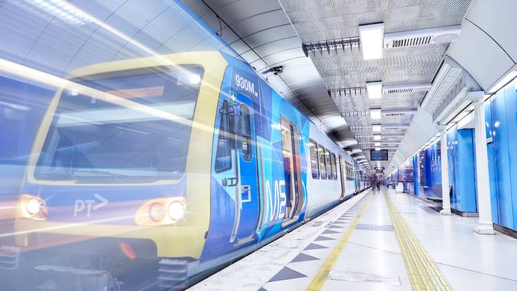 Train zooming through Parliament Station 