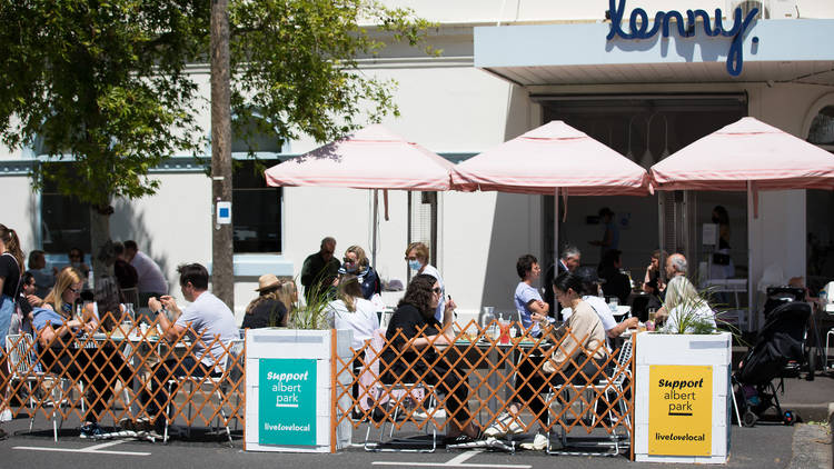 People eat outdoors at café Lenny in Albert Park