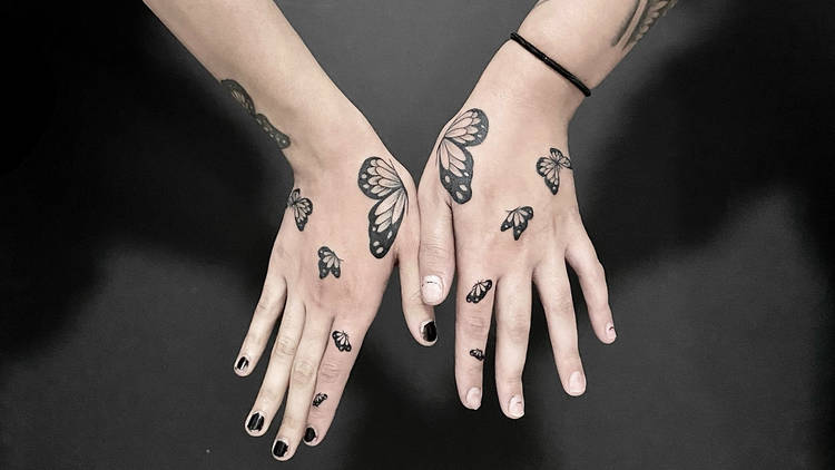 Butterfly Hand Tattoo (Uplift Tattoo)