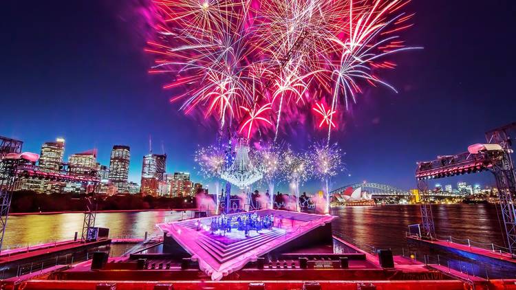 Fireworks erupt over the spectacular La Traviata set for Handa Opera on Sydney Harbour