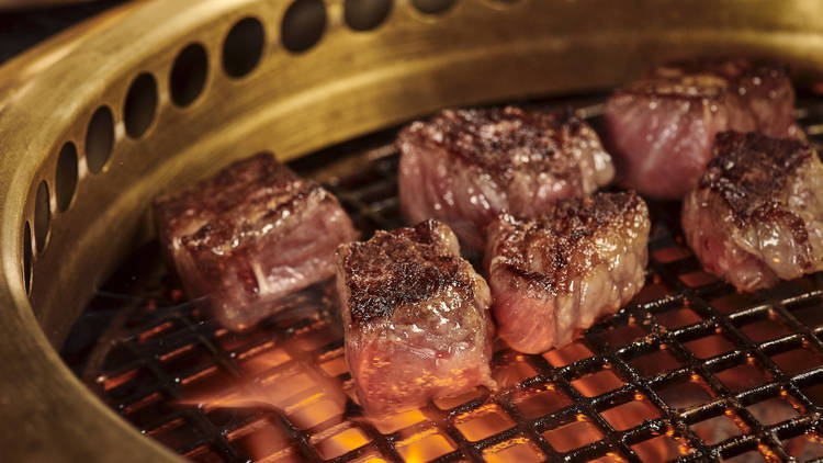 Circle up around the grill at Korean BBQ