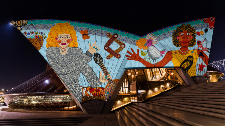 Projections of First Nations women on the Opera House sails