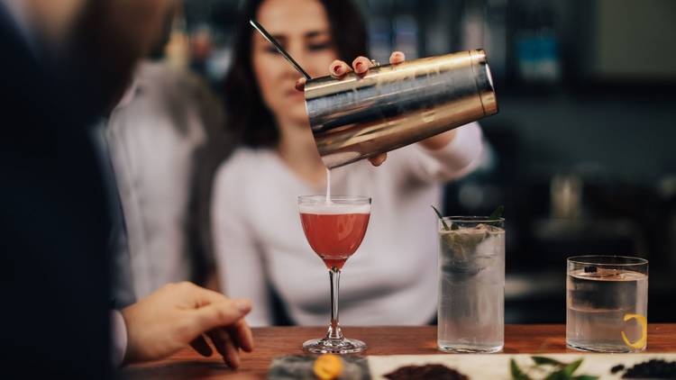 Bartender pouring non-alcoholic cocktail at Brunswick Aces