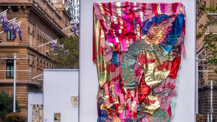A textural tapestry predominantly in pink  on show in Martin Place