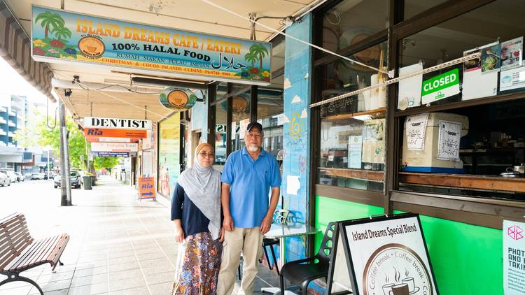 Owners stand outside Island Dreams Café