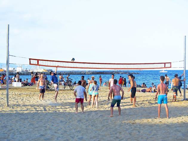 Barcelona,,Spain,-,July,16th,2016:,Youth,Group,Playing,Beach Barcelona, Spain - July 16th 2016: youth group playing beach volley