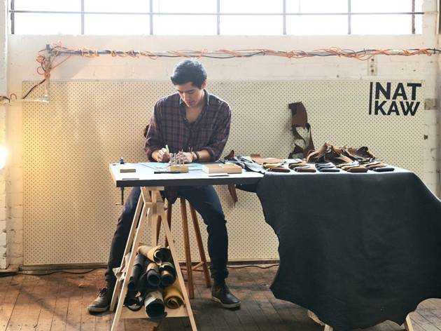 Woodburn Creatives leather wallet-maker Nat Kaw at work at Woodburn Creatives