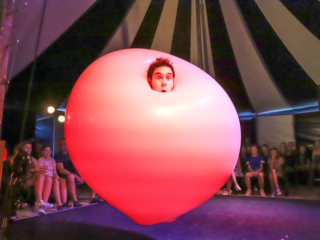 Mr Jeff A man's face emerges from a giant pink bubble with an impressed audience in the background