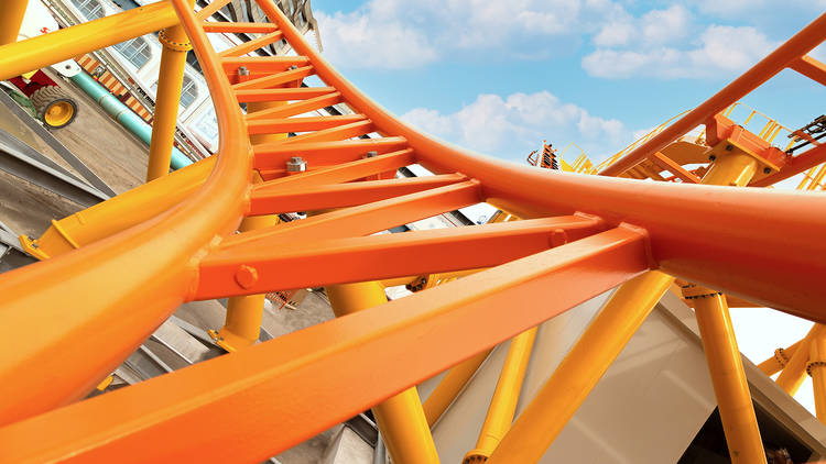 Front seat POV on the bright orange Boomerang rollercoaster at Luna Park.