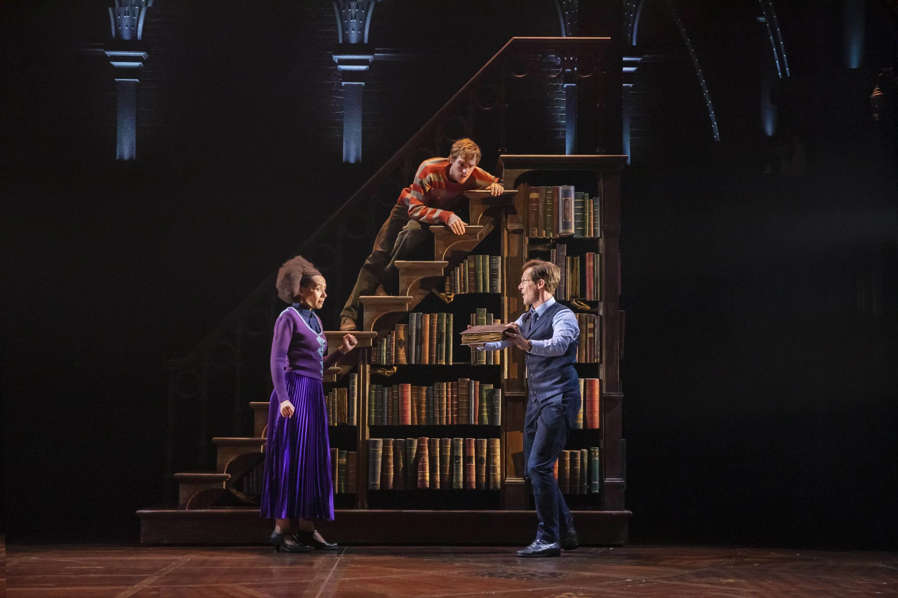 Three actors portraying Hermione, Harry and Ron on stage for Harry Potter and the Cursed Child