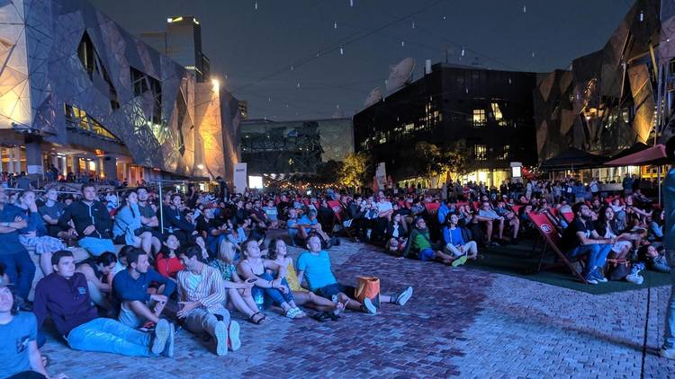 People watching a movie in Fed Square