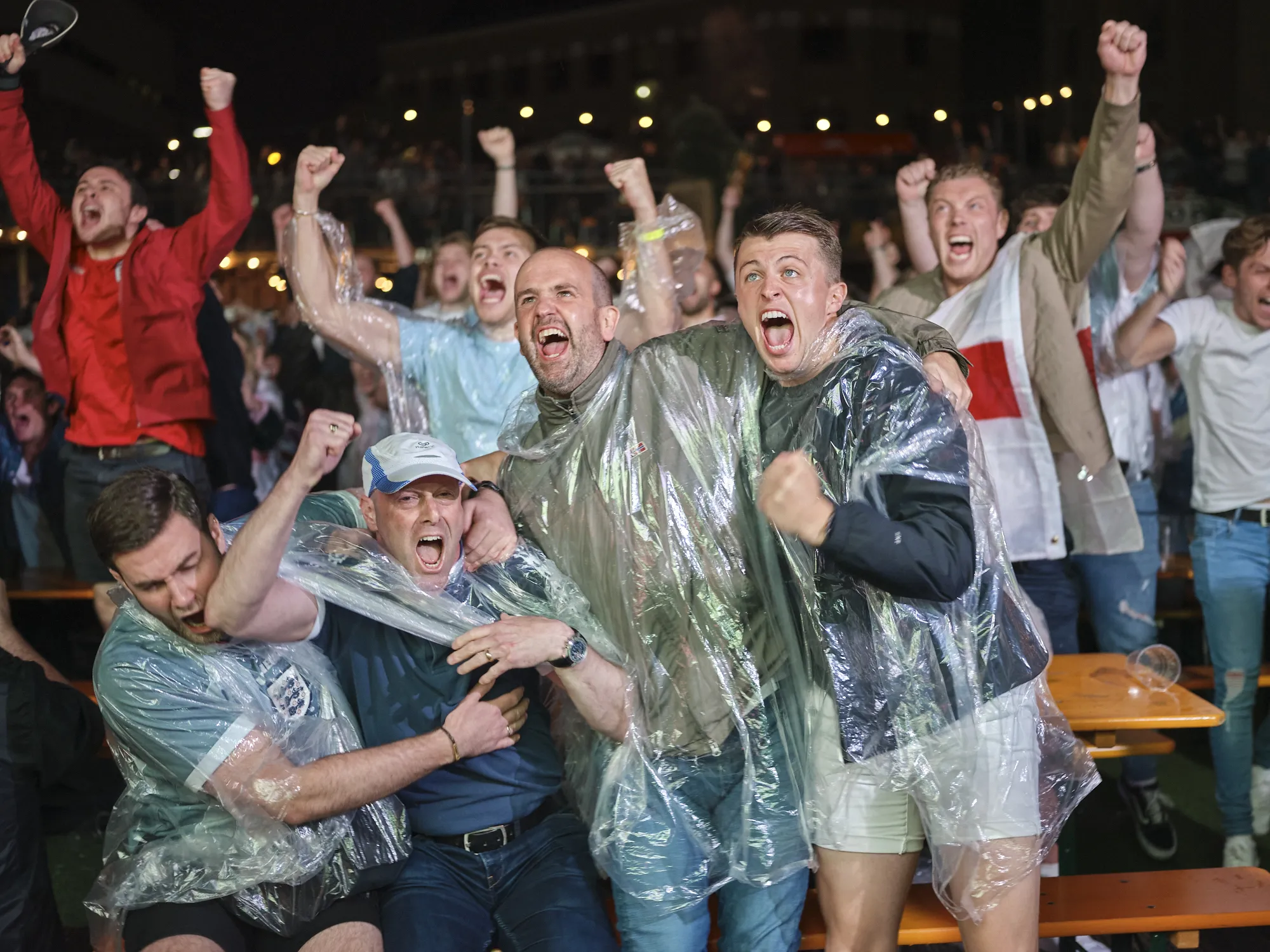 England fans in the rain, shouting